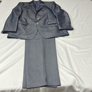 Lauren Ralph Lauren’s green label suit. 60% rayon 40% polyester. Made in Vietnam